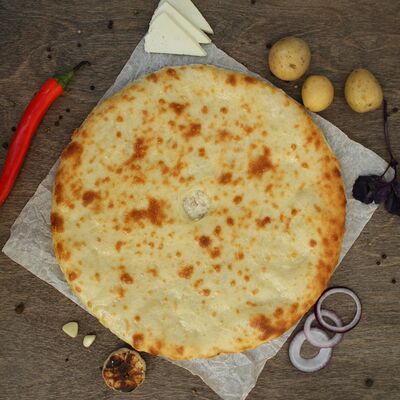 Осетинский пирог с грибами и картошкой в Арв7 по цене 1160 ₽