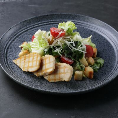 Салат Цезарь с курицей в Kioto по цене 655 ₽