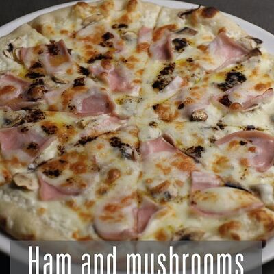 Пицца Ветчина и грибы в Рестобар Гриль 39 по цене 1050 ₽