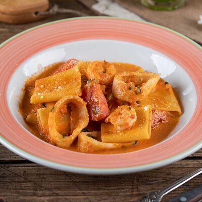 Паккери с креветками и кальмарами в Pizzamento по цене 950 ₽