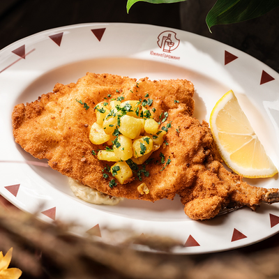 Шницель из свинины на косточке в ЮжанеГорожане по цене 938 ₽