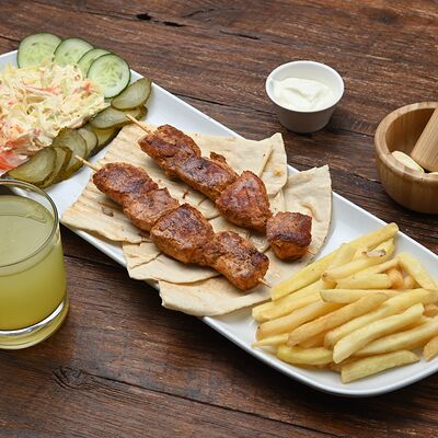 Шашлычок на тарелке в Doner & Pizza по цене 610 ₽