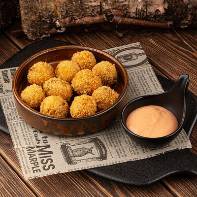 Картофельные крокеты с беконом с соусом в Паб 357 по цене 455 ₽