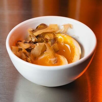 Маринованное яйцо в Kurama Ramen по цене 150 ₽