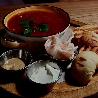 Борщ с пампушками в The Kabak по цене 680 ₽