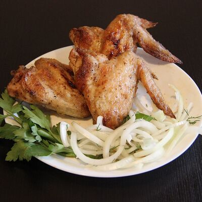 Куриные крылья на мангале в Наш дворик по цене 510 ₽