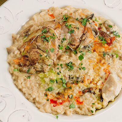 Ризотто с цыпленком и белыми грибами в Паста Фэмили по цене 790 ₽