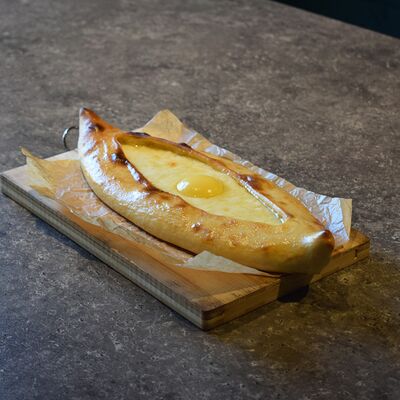 Хачапури по-аджарски⁣ маленькая лодочкав La Terrasse по цене 450 ₽