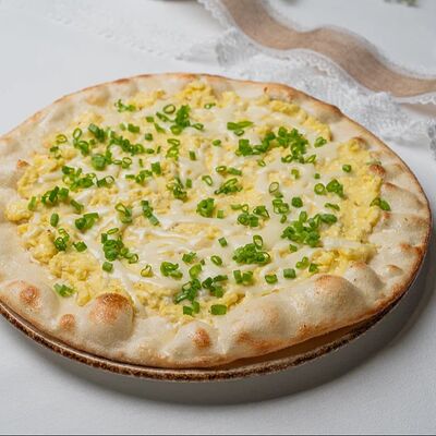 Лепёшка с картофелем и творогом М в Та самая на Хмельницкого по цене 446 ₽