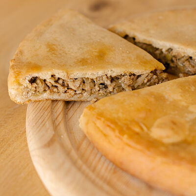 Осетинский пирог с говяжьим фаршем в Машенькины пироги по цене 1620 ₽