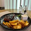 Стейк из cвинoй шей BBQ в Mews Restaurant по цене 650