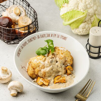 Запеченная цветная капуста с белыми грибами в АндерСон по цене 770 ₽