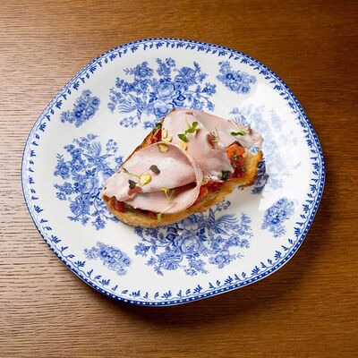 Тост с мортаделлой и томатами в Tutta La Vita по цене 720 ₽