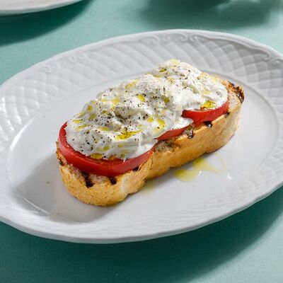 Брускетта со страчателлой и томатами в Кукумбер по цене 560