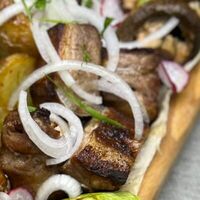 Шея свиная на мангале в Teppanyaki
