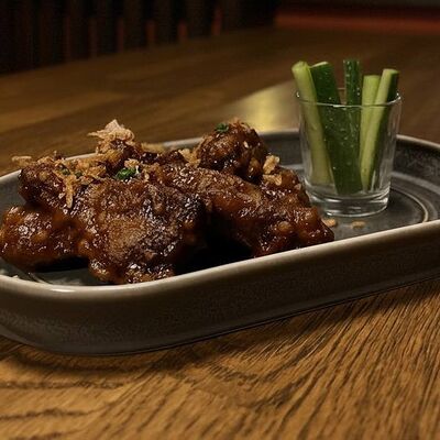 Куриные крылья в арахисовом соусе в Порт по цене 730 ₽