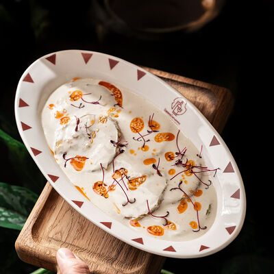 Жаренные цукини под соусом уцка с кахетинским маслом в ЮжанеГорожане по цене 508 ₽