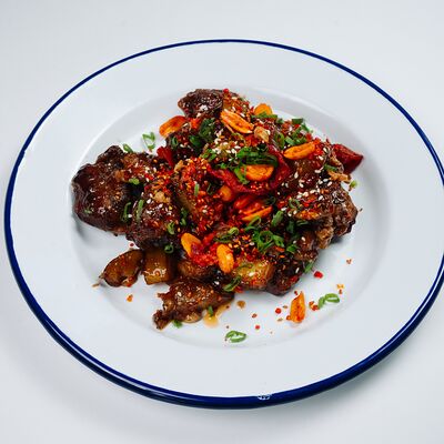 Свиные рёбра с баклажанами в кисло-сладком соусе в Китайка по цене 890 ₽