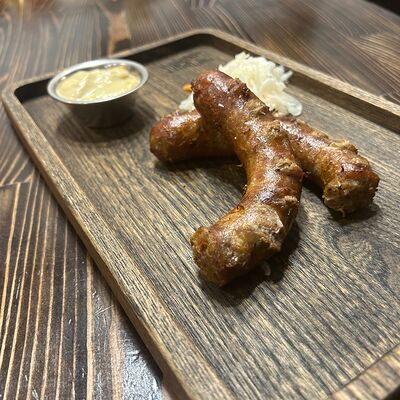 Колбаски из свининыв Бардак Бар по цене 580 ₽