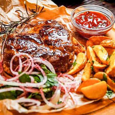 Стейк из свинины в Lounge-Café Marrakech по цене 430 ₽