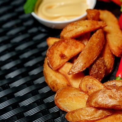 Картофель по-Деревенски со специямив Шаурмэн по цене 230 ₽