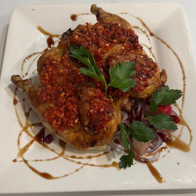 Цыпленок в аджике с картофелем в Гостиный дворик по цене 810 ₽