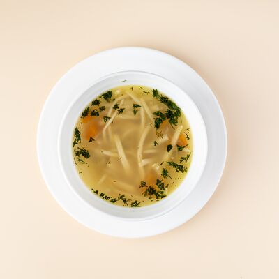 Куриный суп с домашней лапшой и грибами в Шарики по цене 290 ₽