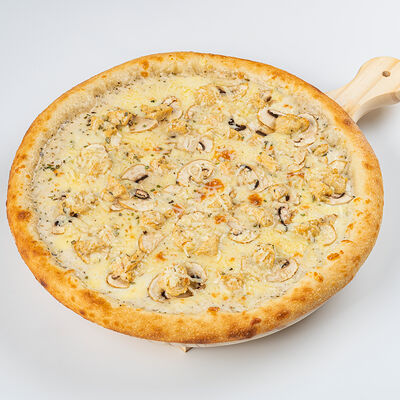 Пицца с курицей и грибами в Unit по цене 710 ₽