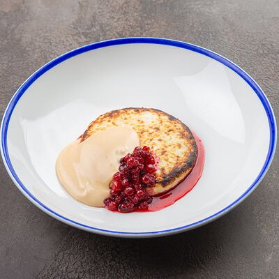 Сырник из домашней рикотты в Искра Бистро по цене 500 ₽