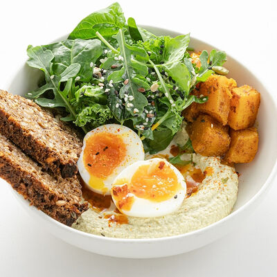 Хумус из тыквенных семечек с яйцом пашот в Nothing Fancy по цене 990 ₽