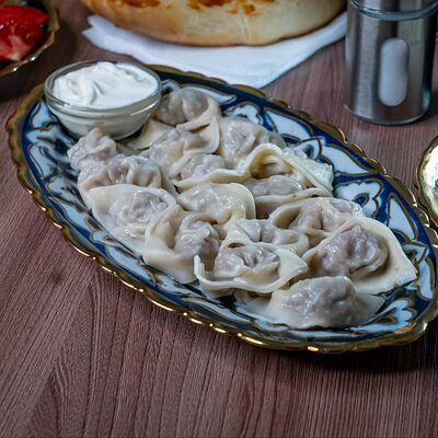 Пельмени в Узбекская кухня по цене 370 ₽