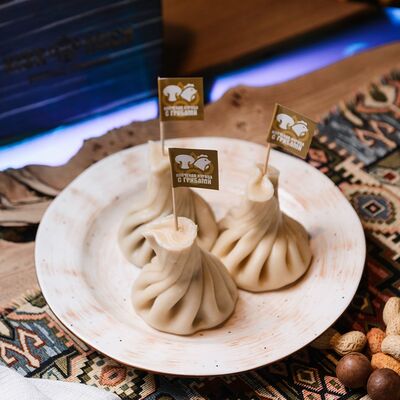Хинкали с копченой курицей и грибами в Kish-Mish по цене 200 ₽