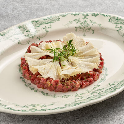 Тартар из бычка с сыром тет-де-муан в Bist по цене 1090 ₽