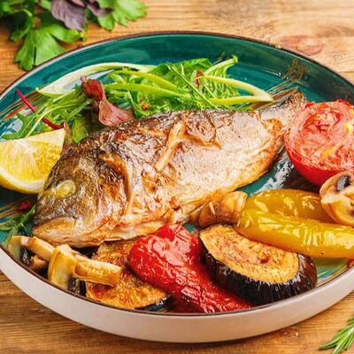 Дорадо на углях с овощами в Шашлычный Домик по цене 950 ₽