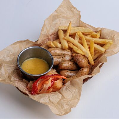 Фирменные куриные колбаски Biteв PINTA Bar & Grill по цене 4390 ₸