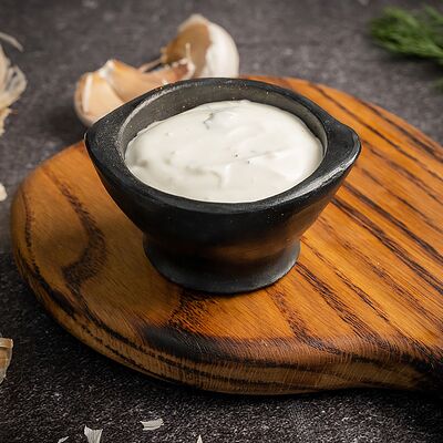 Соус Чесночный в Бакинский дворик по цене 50 ₽