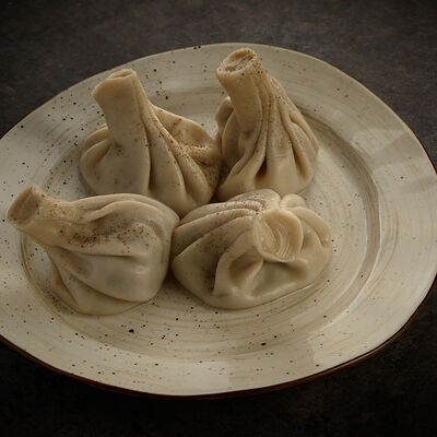 Хинкали с сыром и шпинатом в Campus Grill по цене 420 ₽