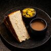 Чизкейк Сан-Себастьян с конфитюром из маракуйи и солёной карамели в Nomad по цене 780