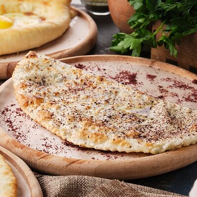 Кутаб с сыром и зеленью в Mangal House по цене 280 ₽