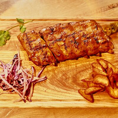 Рёбрышки в медово-горчичном соусе в Geografia по цене 1195 ₽