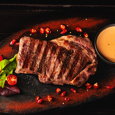 Стейк Нью-Йорк (за сто грамм) в Рестобар Литера по цене 1190 ₽